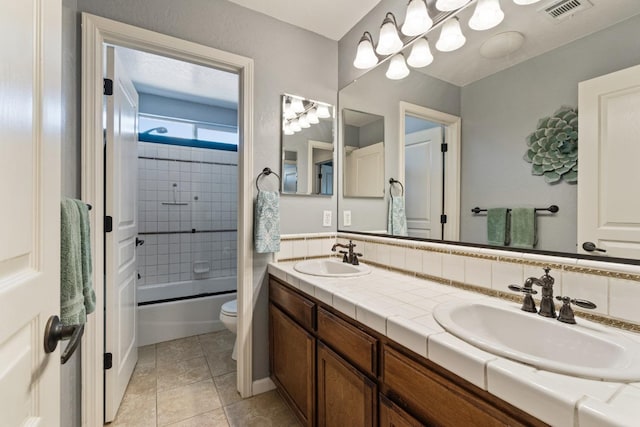 1389 Vineyard Pl, Hanford, CA 93230 - bathroom with double vanity, toilet, visible vents, and a sink