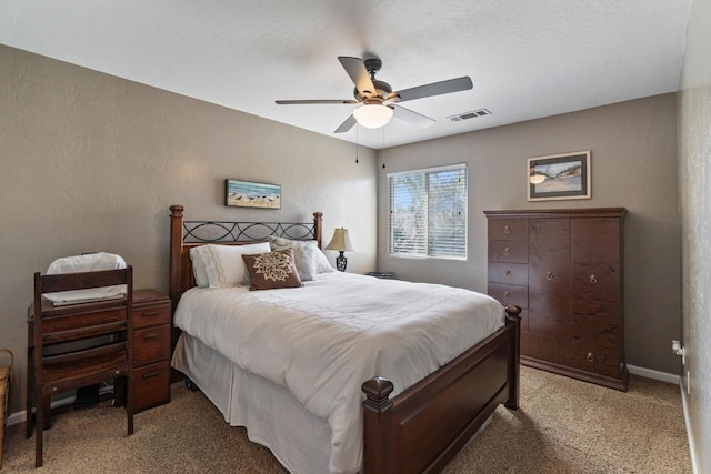 1389 Vineyard Pl, Hanford, CA 93230 - bedroom with visible vents, a ceiling fan, baseboards, and light carpet