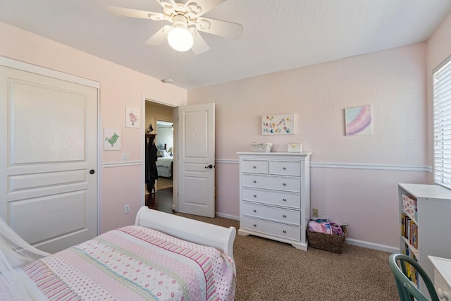 1389 Vineyard Pl, Hanford, CA 93230 - carpeted bedroom with baseboards and a ceiling fan