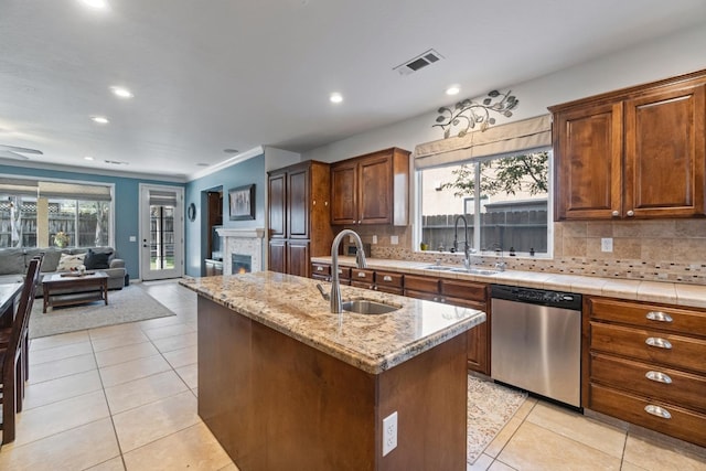 1389 Vineyard Pl, Hanford, CA 93230 - kitchen featuring visible vents, a sink, dishwasher, and open floor plan