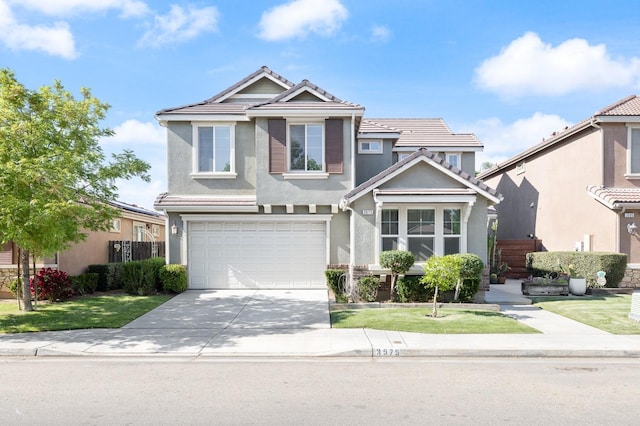 traditional-style house featuring an attached garage, driveway, a tile roof, and stucco siding