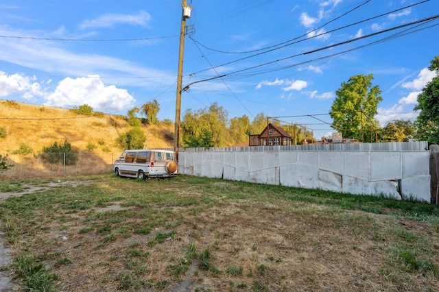 view of yard with fence