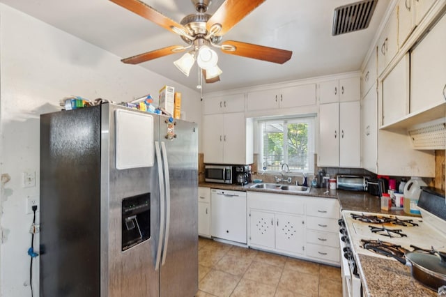 kitchen with visible vents, a ceiling fan, a sink, appliances with stainless steel finishes, and light tile patterned floors