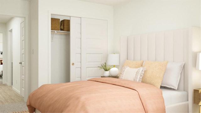 bedroom featuring wood finished floors and a closet