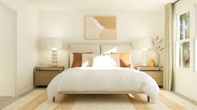 bedroom featuring baseboards