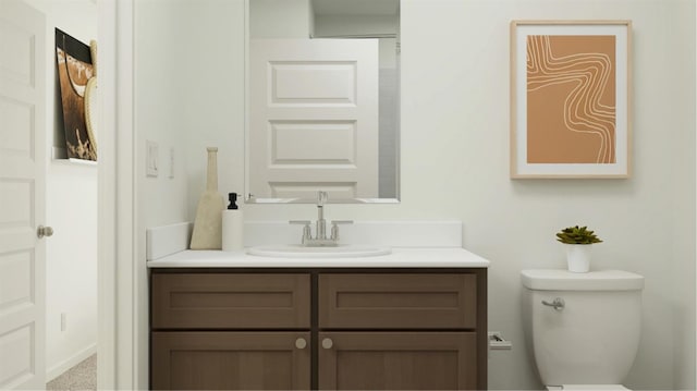 bathroom with vanity and toilet