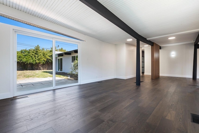 spare room featuring visible vents, wood finished floors, beam ceiling, baseboards, and recessed lighting