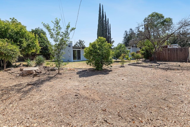 view of yard featuring fence