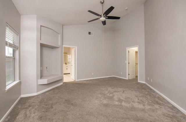 7224 N Bonadelle Ave, Fresno, CA 93720 - unfurnished bedroom featuring high vaulted ceiling, visible vents, baseboards, and carpet