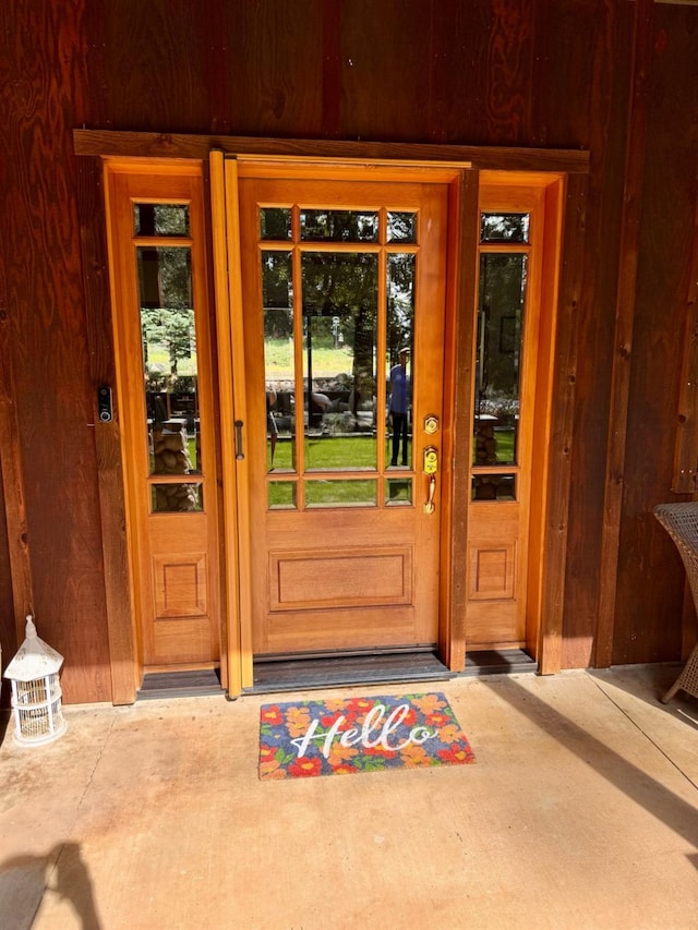 view of exterior entry featuring french doors