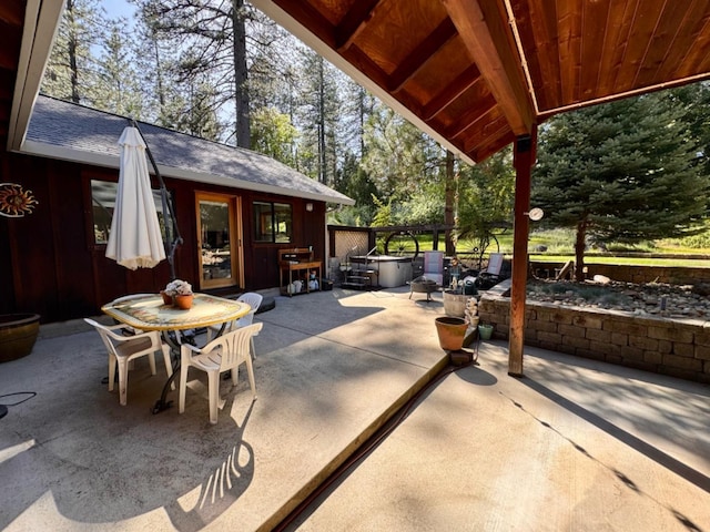 view of patio featuring outdoor dining space