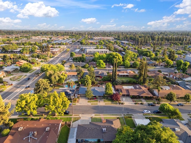 birds eye view of property with a residential view