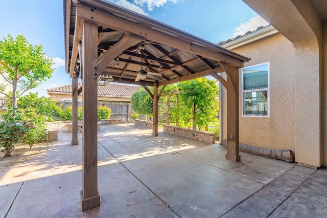view of patio / terrace with fence and a gazebo