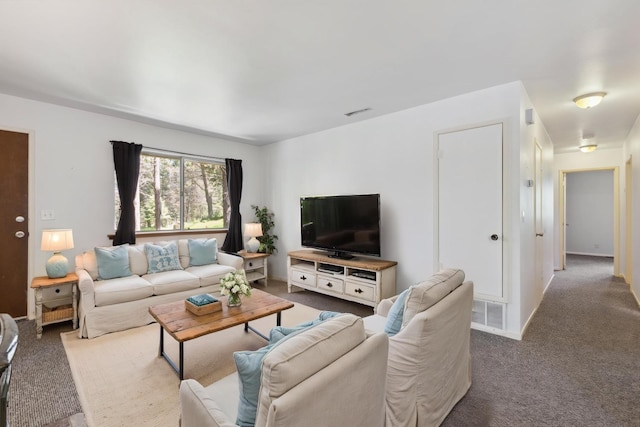 living area with carpet and visible vents