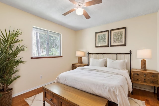 7112 Snyder Ridge Rd, Mariposa, CA 95338 - bedroom with wood finished floors, baseboards, and a ceiling fan