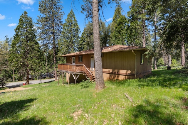 back of house with stairway and a deck