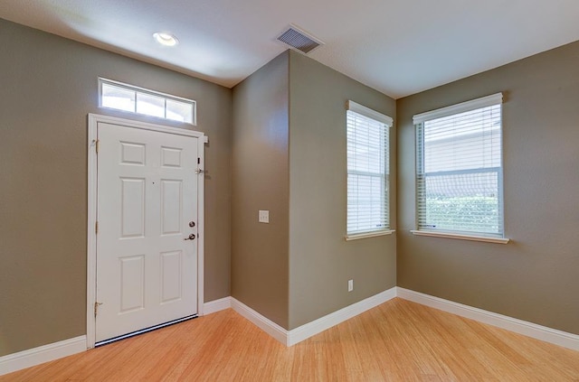 619 W Casanova Ln, Clovis, CA 93619 - entryway with light wood-style floors and baseboards