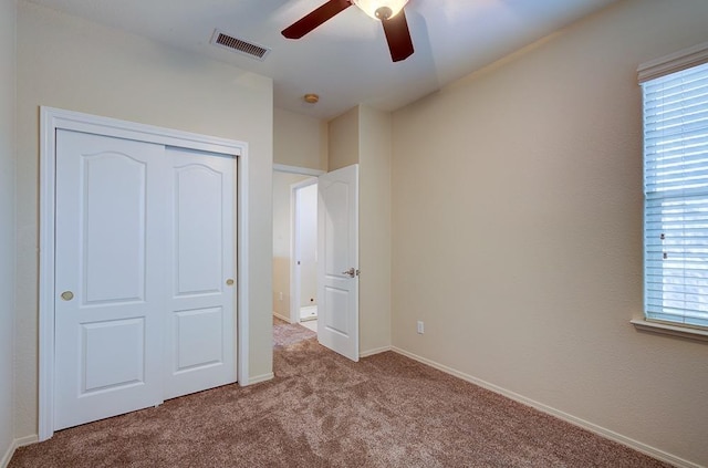 619 W Casanova Ln, Clovis, CA 93619 - unfurnished bedroom with carpet flooring, a closet, and ceiling fan