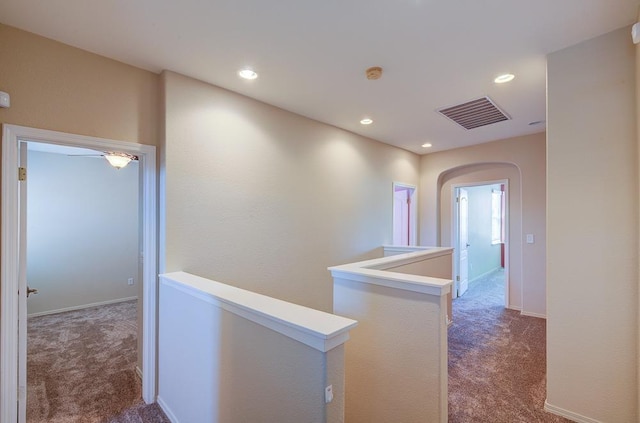 619 W Casanova Ln, Clovis, CA 93619 - hallway featuring an upstairs landing, carpet, recessed lighting, arched walkways, and baseboards
