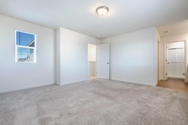 6260 E Malbec Dr, Fresno, CA 93727 - unfurnished room featuring carpet flooring, baseboards, and visible vents