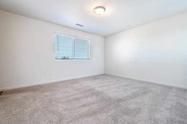 6260 E Malbec Dr, Fresno, CA 93727 - unfurnished room featuring visible vents, carpet, and baseboards