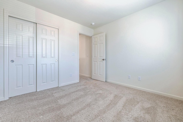 6260 E Malbec Dr, Fresno, CA 93727 - unfurnished bedroom featuring carpet flooring, baseboards, and a closet