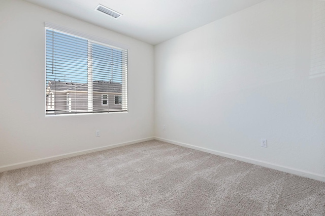 6260 E Malbec Dr, Fresno, CA 93727 - carpeted spare room featuring baseboards and visible vents