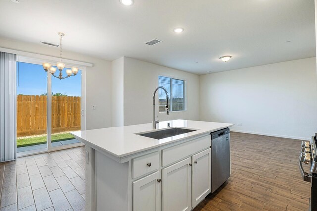 6260 E Malbec Dr, Fresno, CA 93727 - kitchen with visible vents, an inviting chandelier, plenty of natural light, a sink, and stainless steel appliances