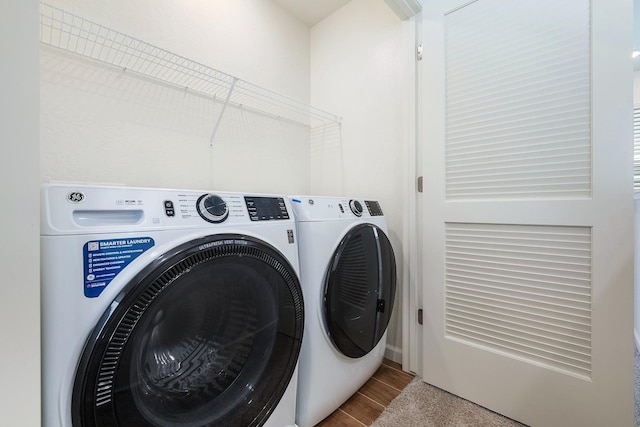 6260 E Malbec Dr, Fresno, CA 93727 - clothes washing area featuring laundry area, wood finished floors, and washer and dryer