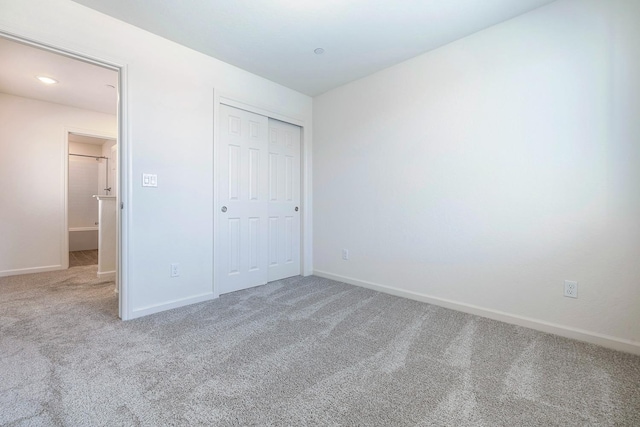 6260 E Malbec Dr, Fresno, CA 93727 - unfurnished bedroom with carpet floors, baseboards, and a closet