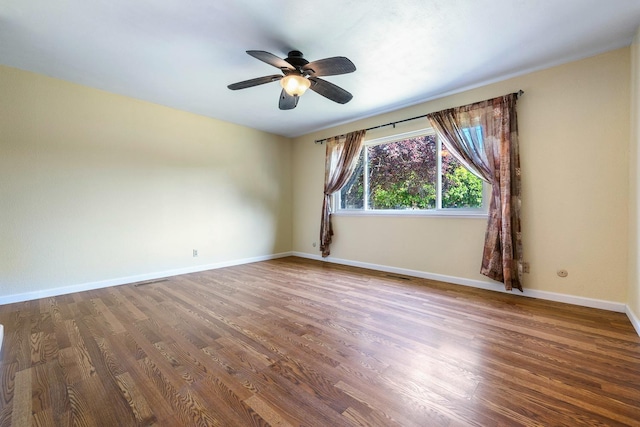 6154 E Alta Ave, Fresno, CA 93727 - unfurnished room featuring ceiling fan, baseboards, visible vents, and wood finished floors