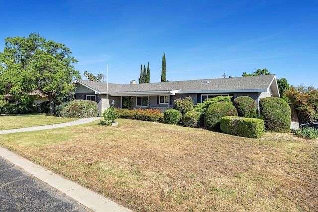 6154 E Alta Ave, Fresno, CA 93727 - single story home featuring a chimney, driveway, and a front lawn