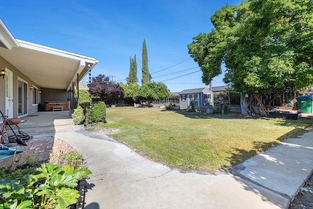 6154 E Alta Ave, Fresno, CA 93727 - view of yard featuring fence, an outbuilding, and a patio
