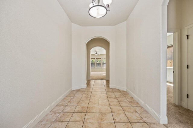 5534 N La Ventana Ave, Fresno, CA 93723 - hall featuring arched walkways and an inviting chandelier