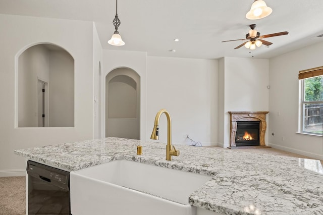 5534 N La Ventana Ave, Fresno, CA 93723 - kitchen featuring ceiling fan, pendant lighting, a sink, baseboards, and black dishwasher