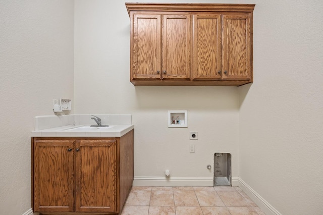 5534 N La Ventana Ave, Fresno, CA 93723 - clothes washing area featuring hookup for a washing machine, gas dryer hookup, a sink, cabinet space, and hookup for an electric dryer