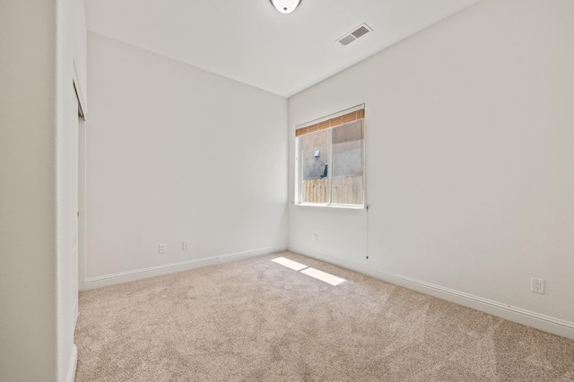 5534 N La Ventana Ave, Fresno, CA 93723 - carpeted spare room with baseboards and visible vents