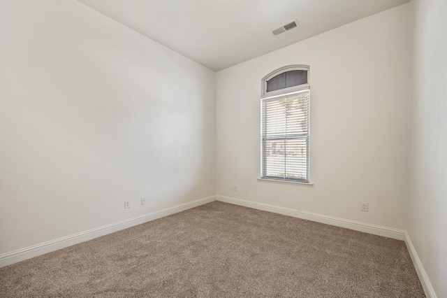 5534 N La Ventana Ave, Fresno, CA 93723 - unfurnished room featuring visible vents, carpet flooring, and baseboards