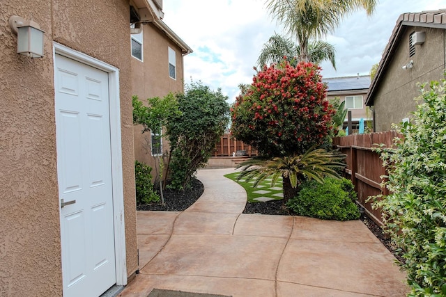 view of yard with a patio and fence