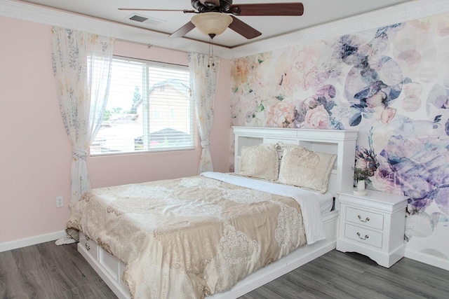 bedroom featuring baseboards, ceiling fan, dark wood-style flooring, and visible vents