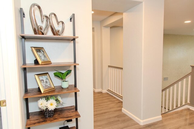3107 Indianapolis Ave, Clovis, CA 93619 - corridor with wood finished floors and recessed lighting