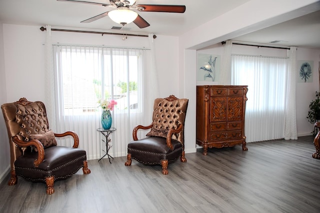 3107 Indianapolis Ave, Clovis, CA 93619 - living area featuring a ceiling fan and wood finished floors