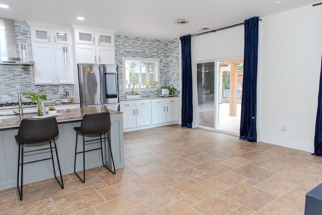 3107 Indianapolis Ave, Clovis, CA 93619 - kitchen with smart refrigerator, stone tile flooring, plenty of natural light, and recessed lighting
