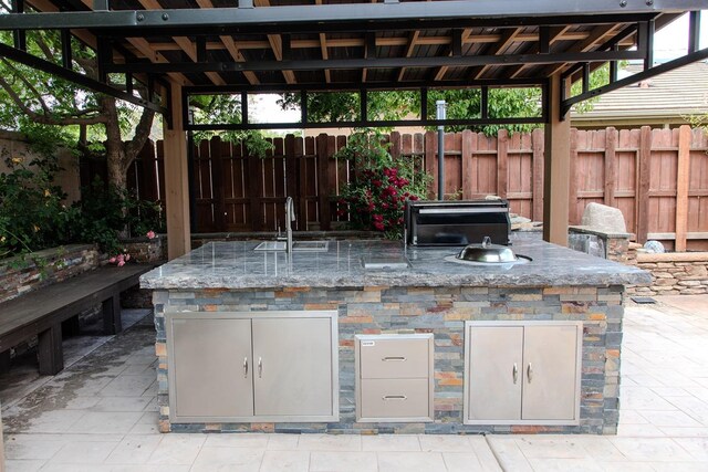 3107 Indianapolis Ave, Clovis, CA 93619 - view of patio / terrace featuring an outdoor kitchen and a sink