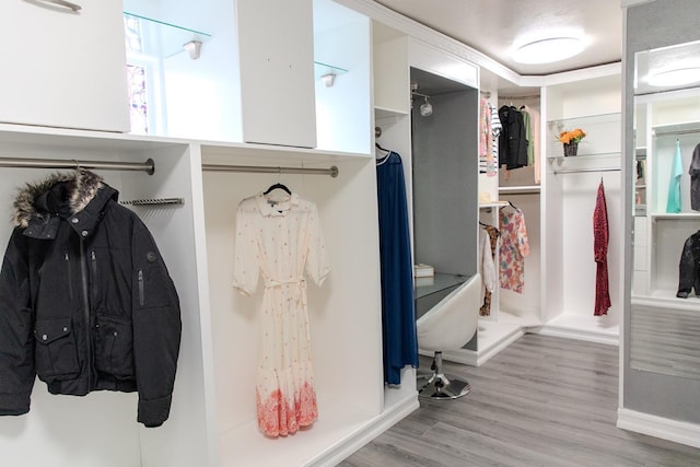 mudroom with wood finished floors