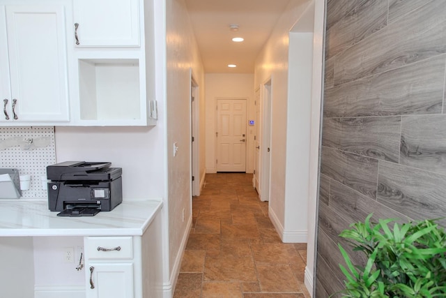 3107 Indianapolis Ave, Clovis, CA 93619 - hallway featuring light stone finish floors and recessed lighting