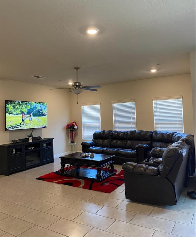 5244 W Fern Ave, Fresno, CA 93722 - living room featuring visible vents, a ceiling fan, light tile patterned floors, and recessed lighting