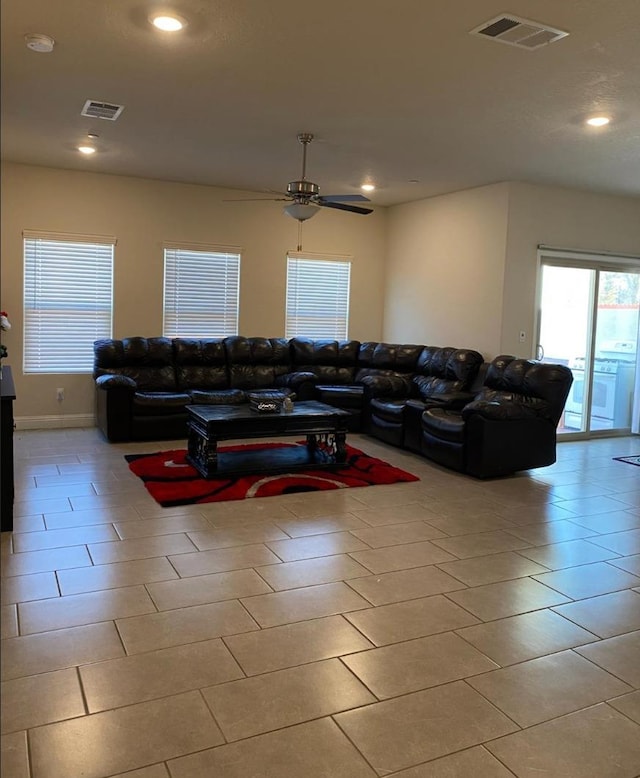 5244 W Fern Ave, Fresno, CA 93722 - living area with ceiling fan, recessed lighting, light tile patterned flooring, and visible vents