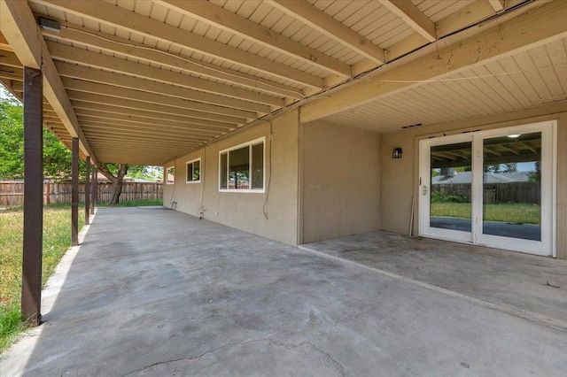 view of patio / terrace featuring fence