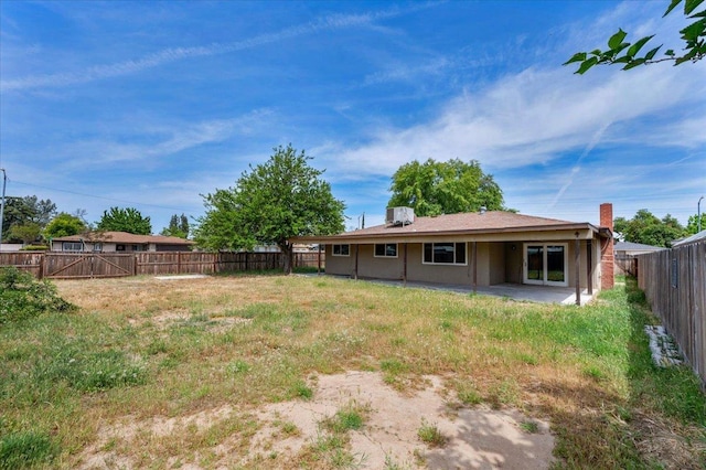view of yard with a fenced backyard and a patio area